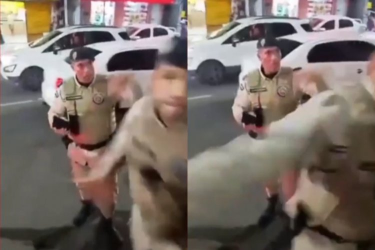 Policial militar dá tapa na cara de homem durante protesto em Salvador